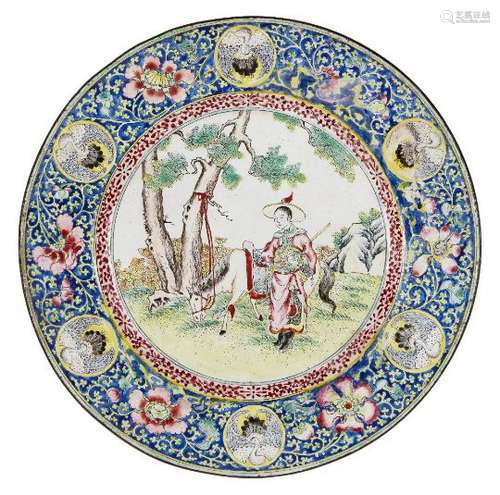 A Chinese Canton enamel plate, late 19th century, painted to the central reserve with a lady and a