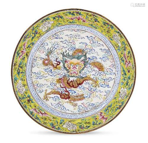 A Chinese painted enamel 'dragon and bats' dish, Qianlong period, decorated to the central reserve