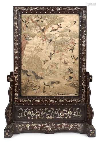 A Chinese hardwood and mother-of-pearl inlaid table screen and stand, mid-19th century, set with