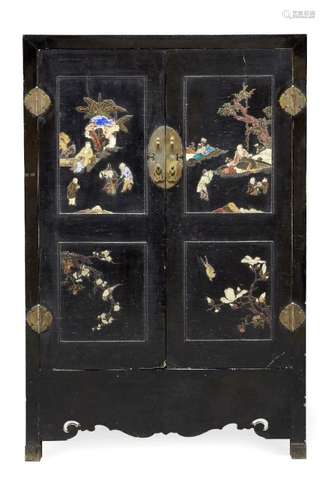 A pair of early Chinese black lacquer and inlaid cabinets, late Qing dynasty, each door set with