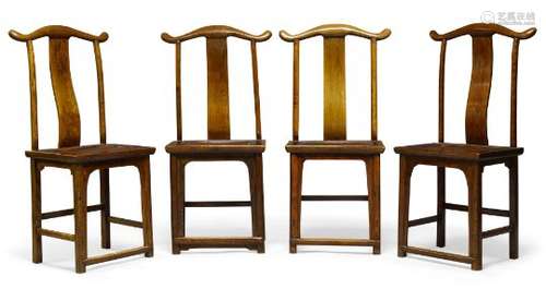 A set of four Chinese elm yoke-back chairs, 19th century, with rattan seatsPlease refer to