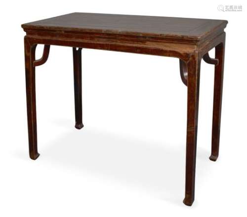 A Chinese lacquered elm rectangular side table, 17th/18th century, the cleated top raised on