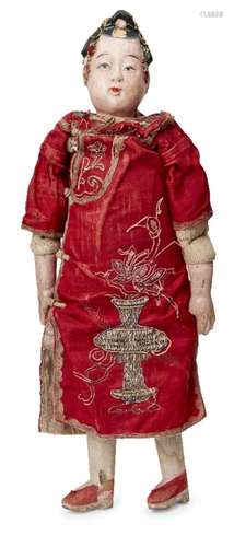 A Chinese composite female doll, early 20th century, with painted features and wearing a red silk