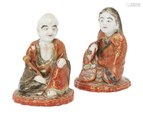 A pair of Japanese Kutani figures, Meiji period, each signed Dai Nippon Kutani to base, male and