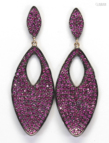 Pair of ruby, blackened silver, 14k yello…