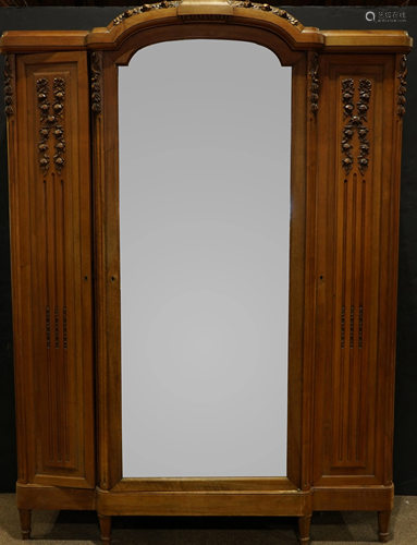 A French Louis XVI style triple door armoire