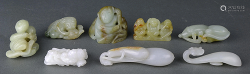 (lot of 8) A group of eight carved Jade figu…