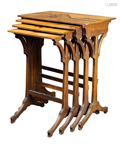 A group of Emile Galle nesting tables