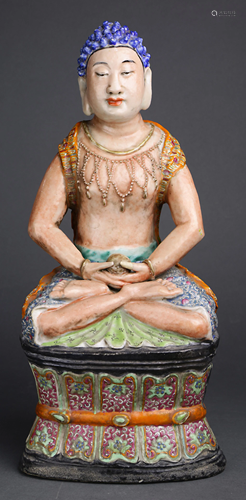 A Chinese famille-rose seated figure of sha…