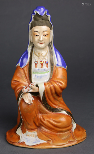 A Chinese Ceramic Seated Figure of Guanyin