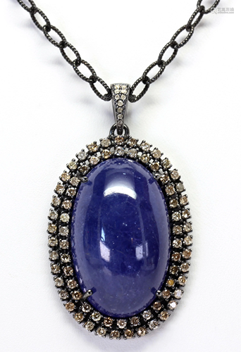 Tanzanite, diamond, blackened silver pendant-…