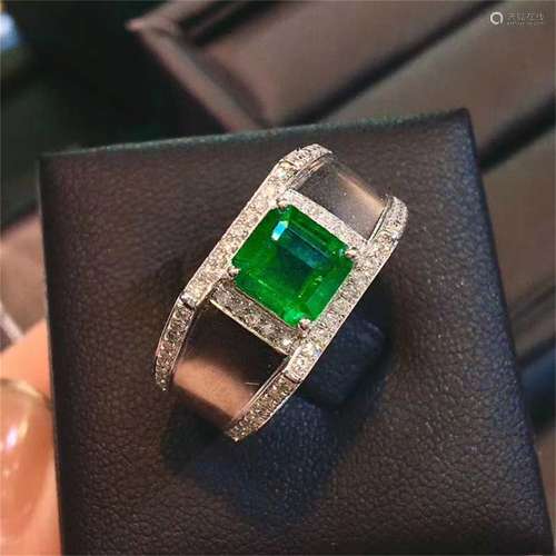 A Chinese Carved Emerald Ring