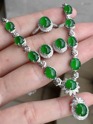 (Natural Light)A Pair of Chinese Carved Jadeite Earrings and A Ring and A Necklace