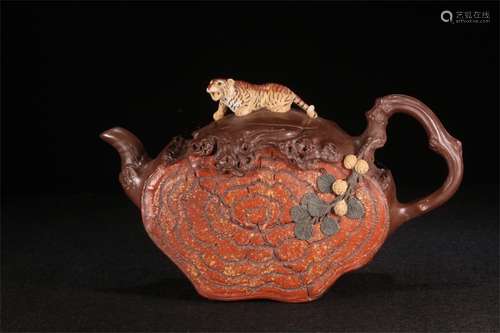 A Chinese Carved Yixing Clay Teapot