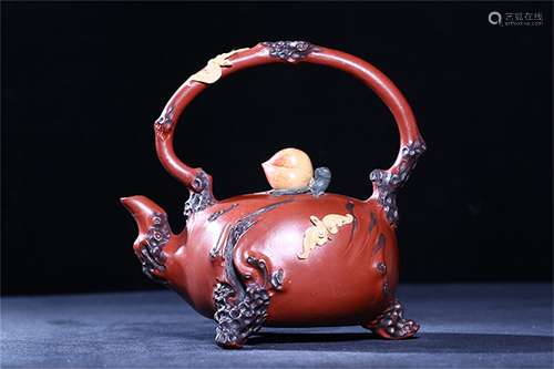 A Chinese Carved Yixing Clay Teapot