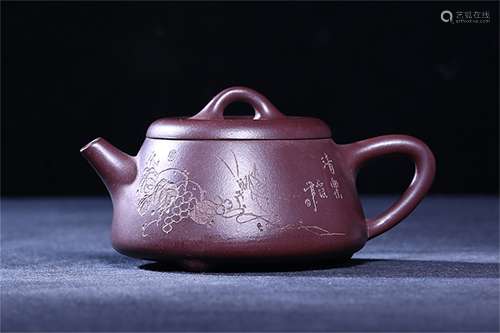 A Chinese Carved Yixing Clay Teapot