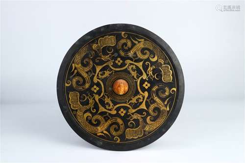 A Chinese Bronze Mirror