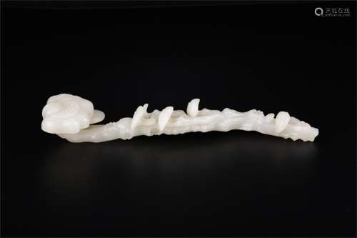 A Chinese Carved Jade Ruyi