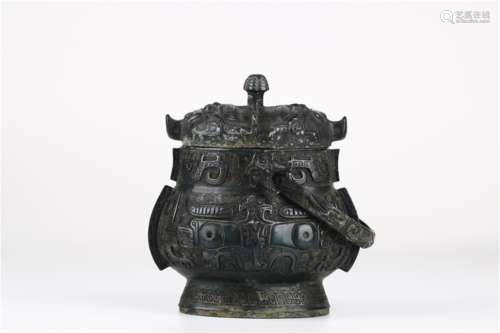 A Chinese Bronze Teapot with Handle