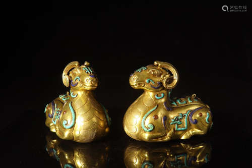 PAIR OF GILT BRONZE CAST APPLIQUE 'RECUMBENT RAM' FIGURES