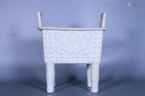 WHITE GLAZED 'TAOTIE' RECTANGULAR CENSER WITH FOUR LEGS AND TWO HANDLES