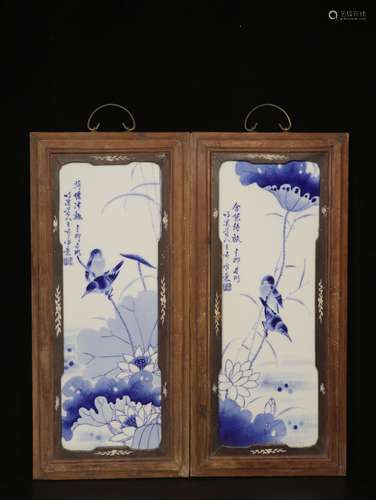 WANG BU: PAIR OF WOOD FRAMED BLUE AND WHITE 'FLOWERS AND BIRDS' PORCELAIN PLAQUES