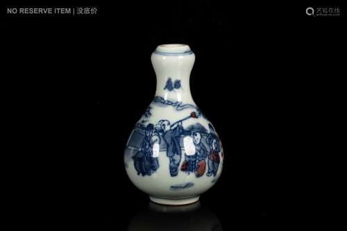 A BLUE AND WHITE AND IRON RED 'FIGURAL' SNUFF BOTTLE