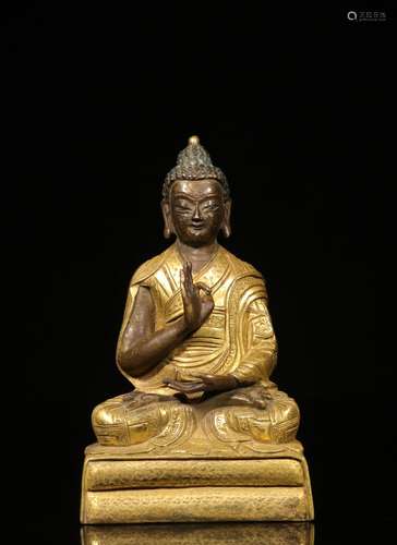 GILT BRONZE CAST SHAKYAMUNI SEATED FIGURE