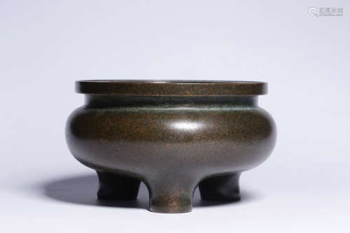 A CHINESE COPPER THREE-LEGGED INCENSE BURNER