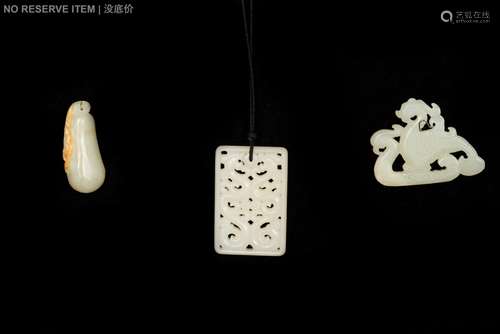 GROUP OF THREE JADE CARVED PENDANTS