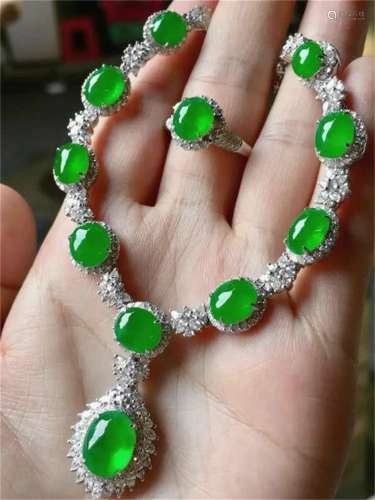 A Set of Chinese Carved Jadeite Necklace and A Ring