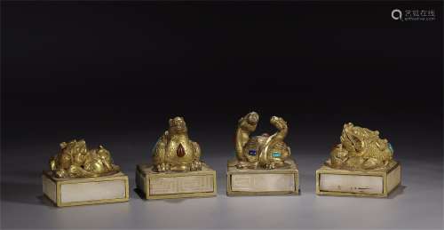 A Set of Four Chinese Gilt Bronze Seals with Jade Inlaid