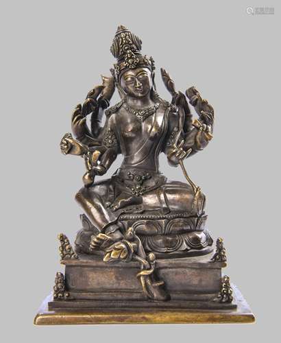 A BRONZE FIGURE OF TEN-ARMED BODHISATTVA, KASHMIR