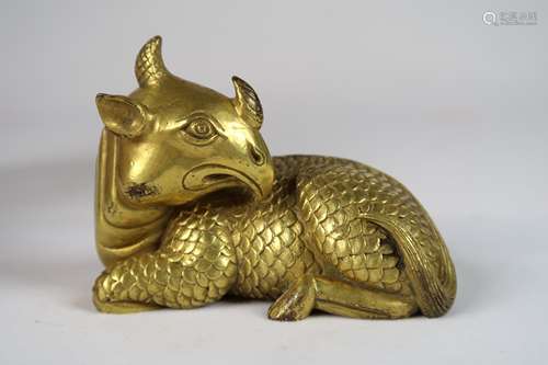 A GILT-BRONZE 'MYTHICAL BEAST' PAPERWEIGHT