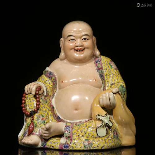 FAMILLE ROSE PORCELAIN FIGURE OF A BUDDHA