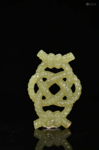 A Carved Yellow Jade Chinese Knot Pendant