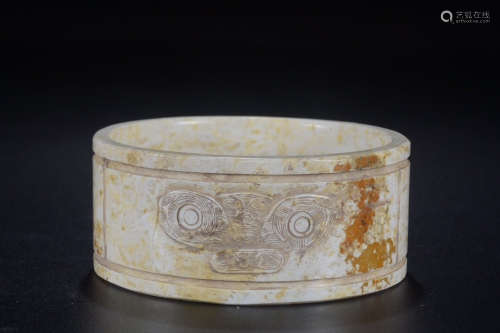 A Chinese Carved Gaogu Jade Armlet