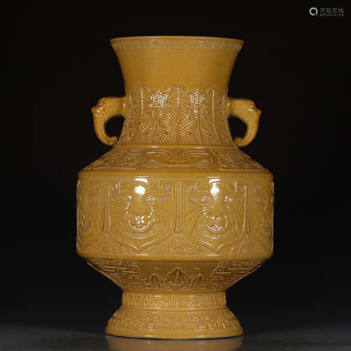 A Chinese Yellow Glaze Beast Pattern Carved Porcelain Vase