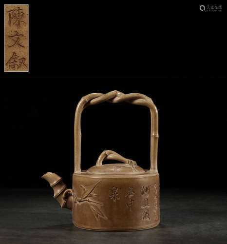 A Chinese Bamboo Joint Carved Purple Sand Pot with Loop-handle