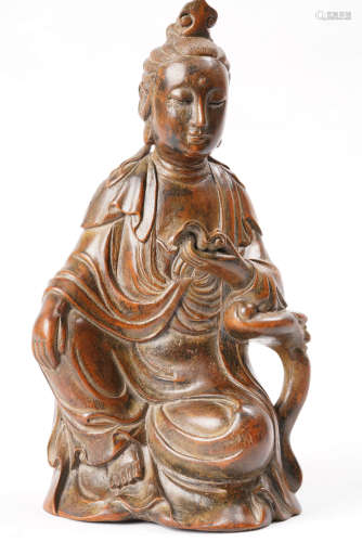 A Chinese Carved Eaglewood Guanyin Statue