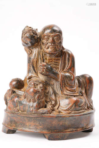A Chinese Carved Eaglewood Arhat Statue