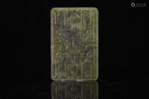 A Chinese Taotie Carved Jade Pendant