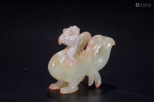 A Chinese Carved Hetian Jade Xuan Bird Ornament