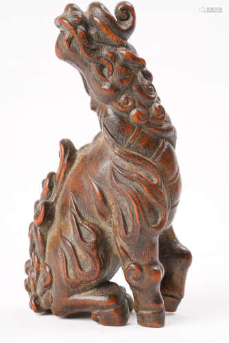 A Chinese Carved Eaglewood Beast Ornament