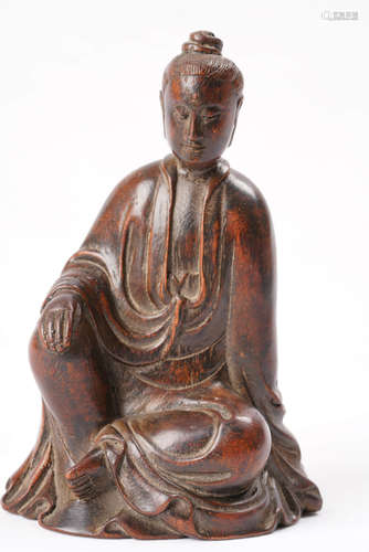 A Chinese Carved Eaglewood Guanyin Statue