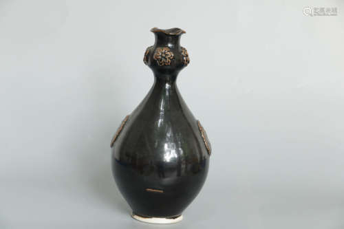 A Chinese Black Glazed Plum blossom Carved Porcelain Vase