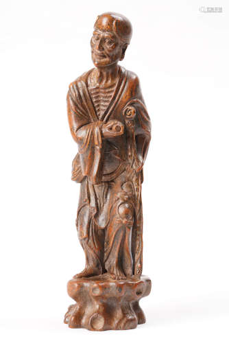 A Chinese Carved Eaglewood Arhat Statue