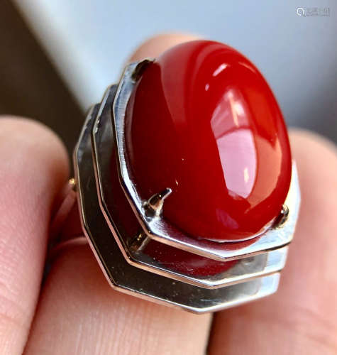 A CORAL AND PLATUNUM RING