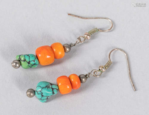 A Pair Of Turquoise Tear Drop Earrings