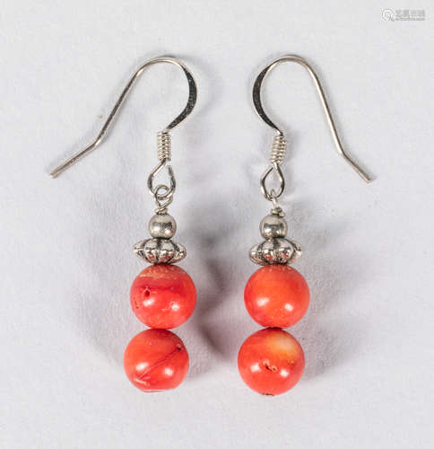 A Pair Of Coral Like Bead Earrings